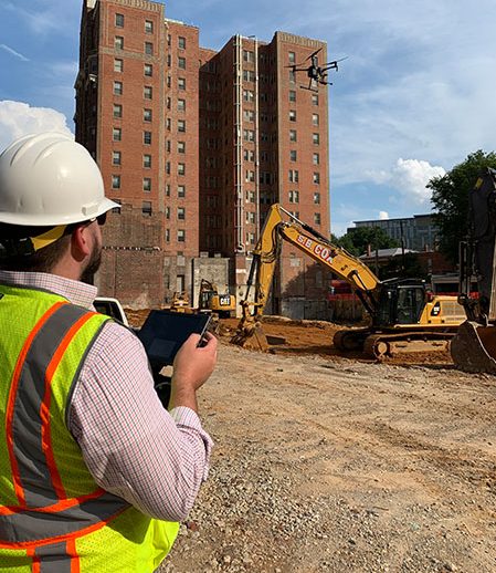 drone being flown on construction site
